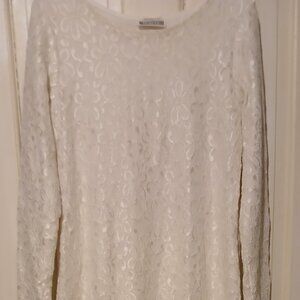 Dressed in white, lace fully lined dress